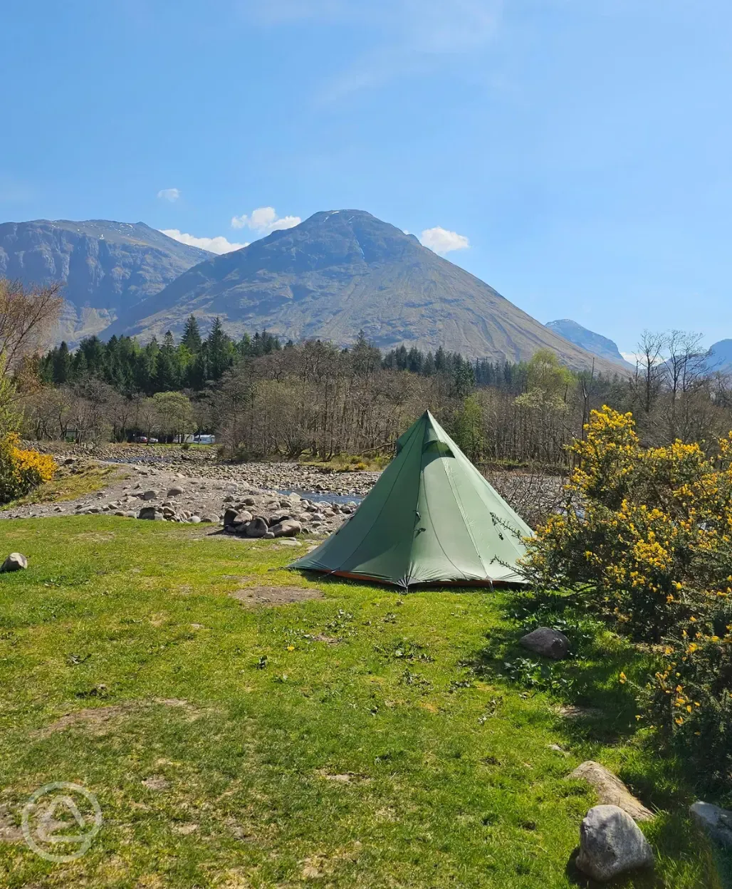 Non electric wild pitches on the banks of the River Coe at Red Squirrel Campsite