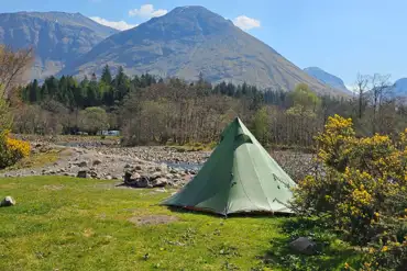 Non electric wild pitches on the banks of the River Coe at Red Squirrel Campsite