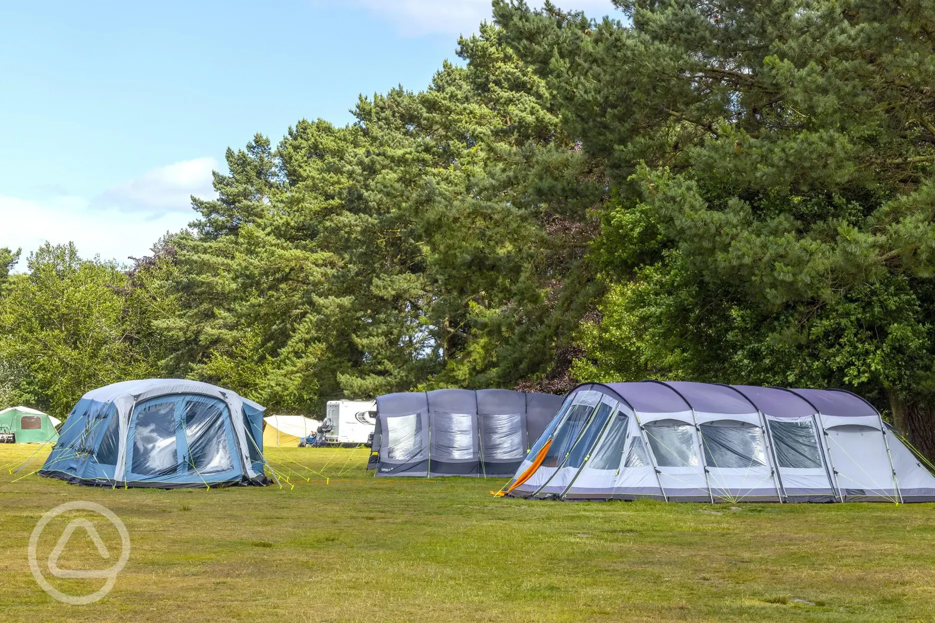 Large tents on the non electric grass pitches (9m x 9m)