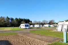 Fully serviced block paved pitches with grass area (awnings allowed) Fully serviced block paved pitches with grass area (awnings allowed)