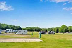 Fully serviced gravel pitches beside grass pitches at Birchwood Tourist Park Fully serviced gravel pitches beside grass pitches at Birchwood Tourist Park