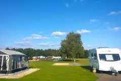 Fully serviced block paved pitches with grass area Fully serviced block paved pitches with grass area