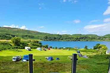 Grass pitches with sea views at Oban Holiday Park