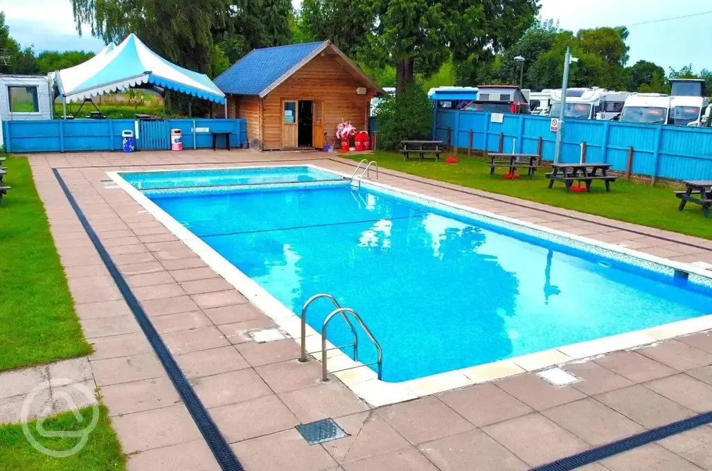 Outdoor heated swimming pool - open end of May to September