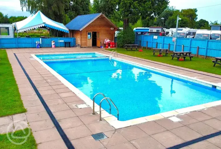 Outdoor heated swimming pool - open end of May to September