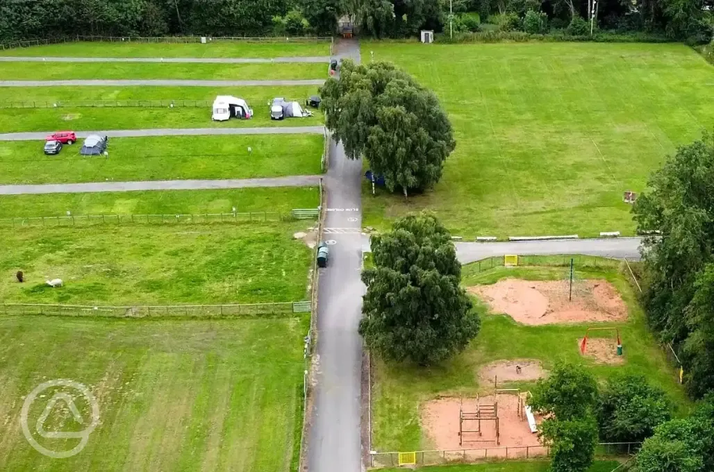 Aerial of the Purple area - tent field grass pitches and park