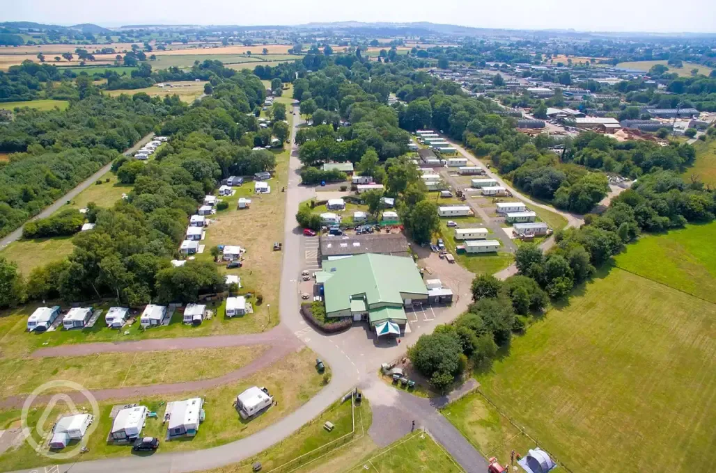 Aerial of the campsite showing White area - JAKKS barn and cafe