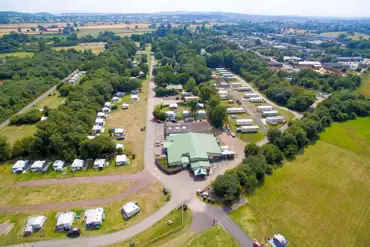 Aerial of the campsite showing White area - JAKKS barn and cafe