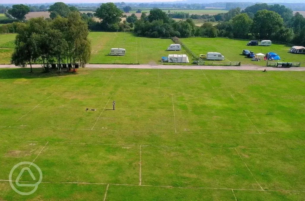 Aerial of the grass pitches and surrounding countryside 