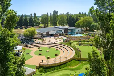 Aerial of The Venue entertainment complex with an outdoor splash park