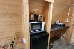 Lakeside ensuite pod with a kitchenette, microwave, toaster, and more