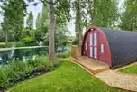 Lakeside ensuite pod exterior with views of Kingfisher Lake