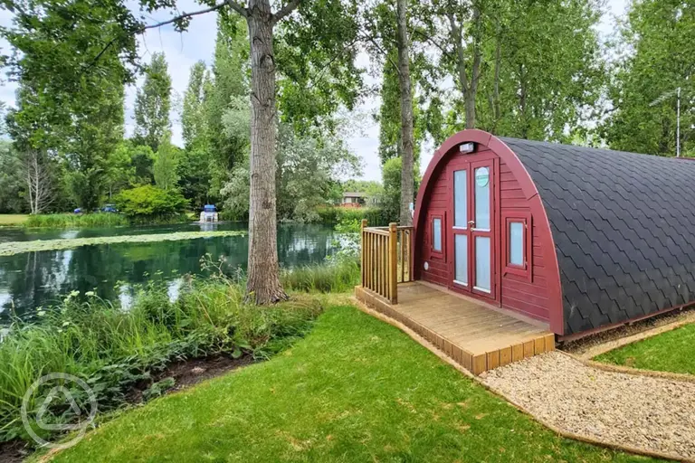 Lakeside ensuite pod exterior with views of Kingfisher Lake