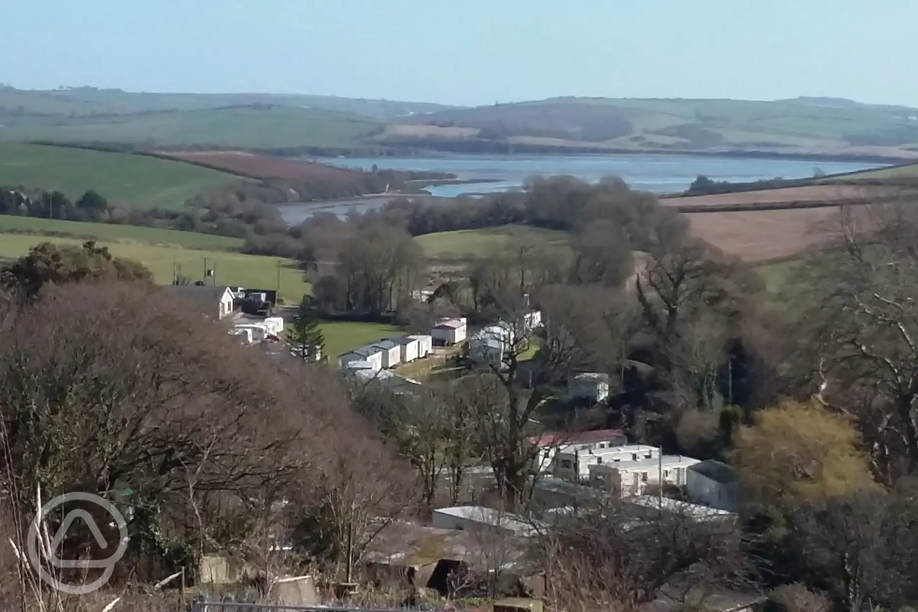 View looking over the site with the estuary at the end of the valley