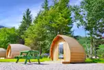 Camping pods with outdoor seating and sleeping two or three people