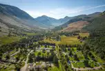 Aerial of Glen Nevis Caravan and Camping Park and surrounding mountains