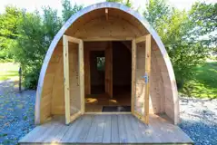 Camping pod with a small wooden decking