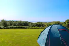 Eisteddfa Caravan and Camping Park with views to Criccieth Beach