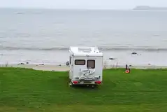 Hardstanding pitches with views over the beach and Atlantic Ocean