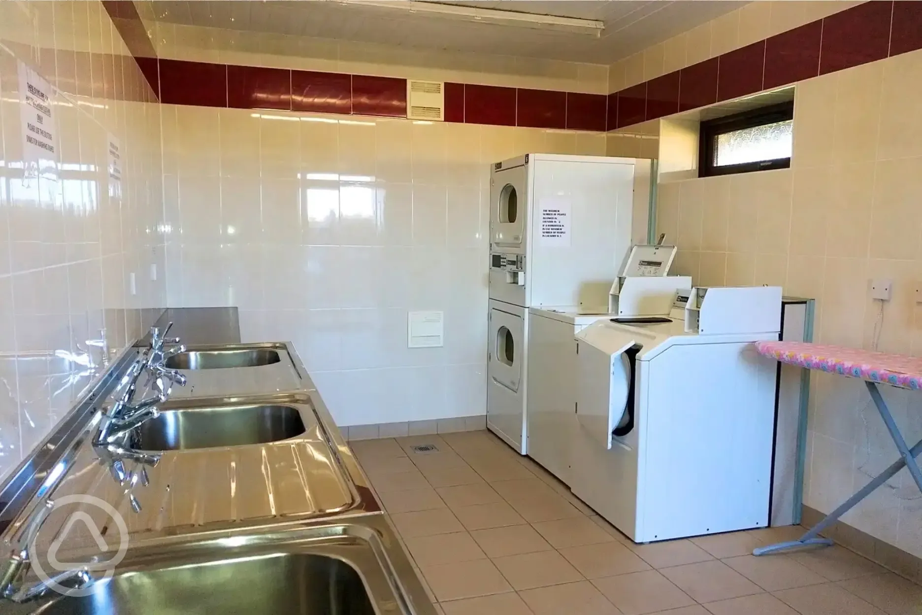Washing up area and laundry room Washing up area and laundry room
