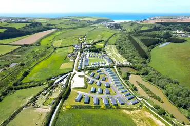 Aerial of Sun Haven Holiday Park with views towards Mawgan Porth