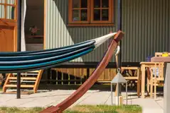Shepherd's hut outdoor area with a hammock Shepherd's hut outdoor area with a hammock