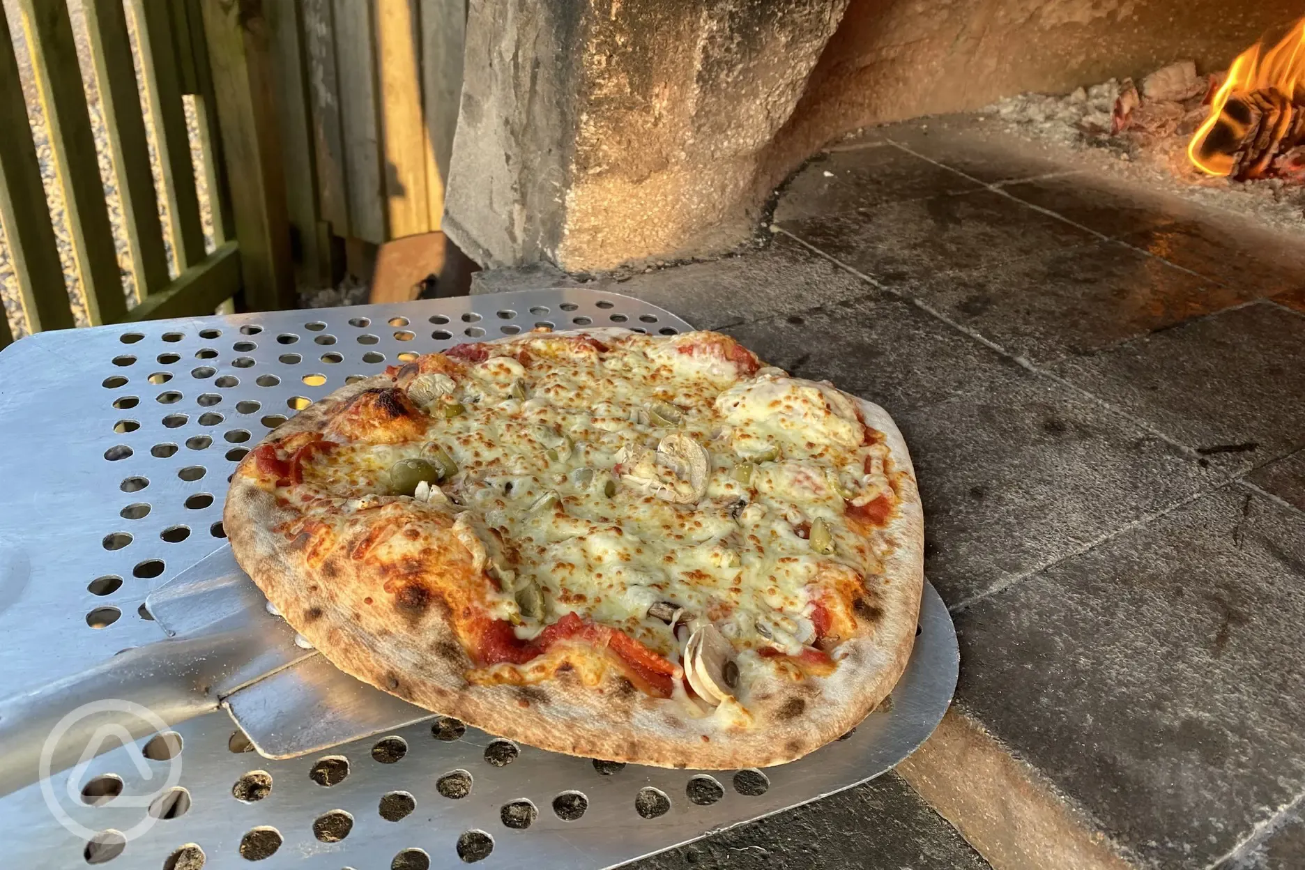 Freshly made wood-fired pizza