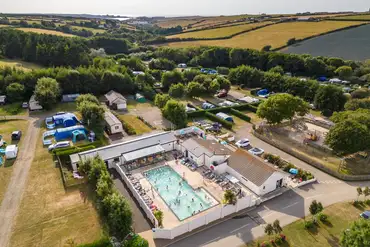 Aerial view of Treloy Touring Park with the outdoor swimming pool