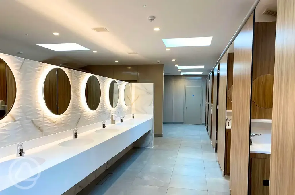 Facilities with light up mirrors and private cubicles