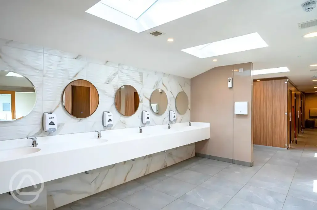 Facilities with light up mirrors and private cubicles