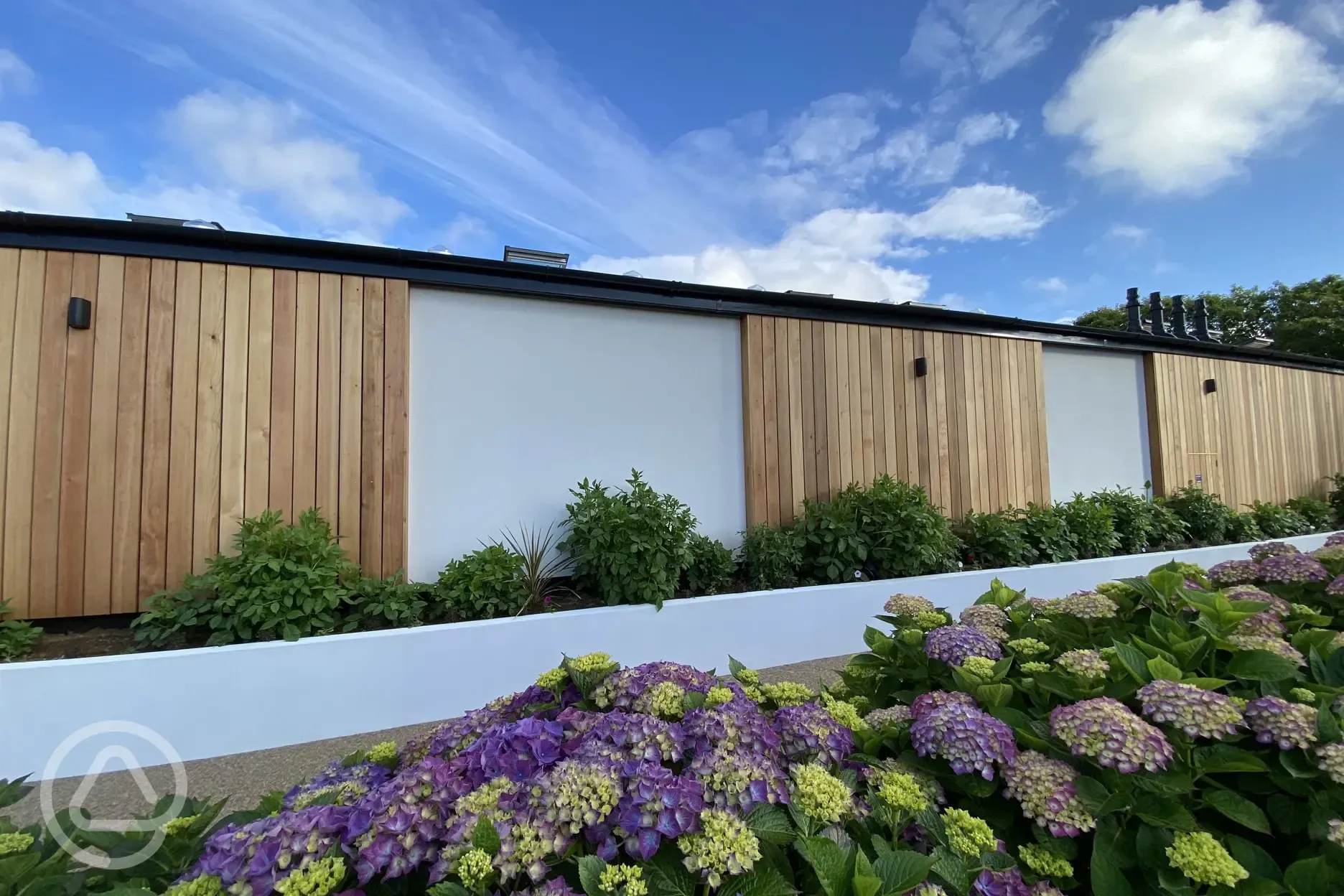 Facilities block with landscaped grounds