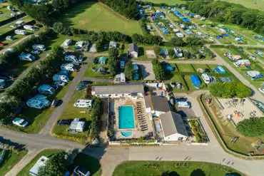 Bird's eye view of Treloy Touring Park with the outdoor swimming pool