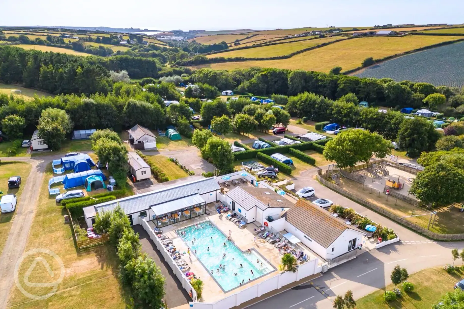 Campsite aerial with outdoor heated swimming pool