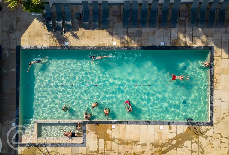Bird's eye view of the outdoor heated swimming pool (open during summer)