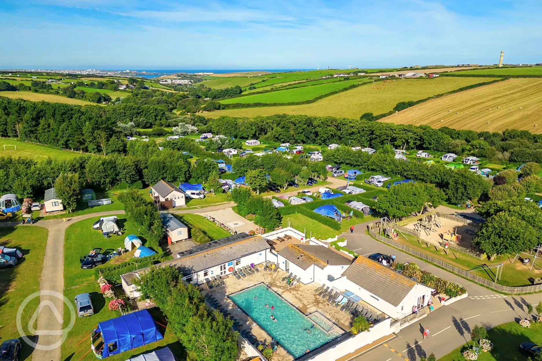 Aerial of Treloy Touring Park with the outdoor heated swimming pool