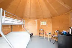 Camping cabin triple sleeper bunk bed and dining space Camping cabin triple sleeper bunk bed and dining space