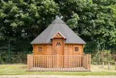 Camping cabin exterior with private decking Camping cabin exterior with private decking