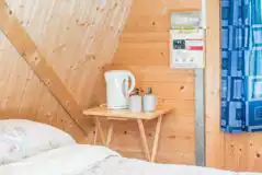 Cocoon camping pod small bedside table with a kettle Cocoon camping pod small bedside table with a kettle