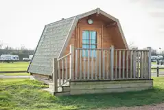Cocoon camping pod exterior with decking Cocoon camping pod exterior with decking