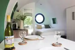 Ensuite glamping pod dining table and chairs