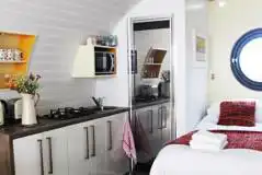 Ensuite glamping pod double bed and kitchenette (bedding provided)
