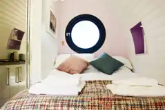 Ensuite glamping pod double bed (bedding and towels provided)