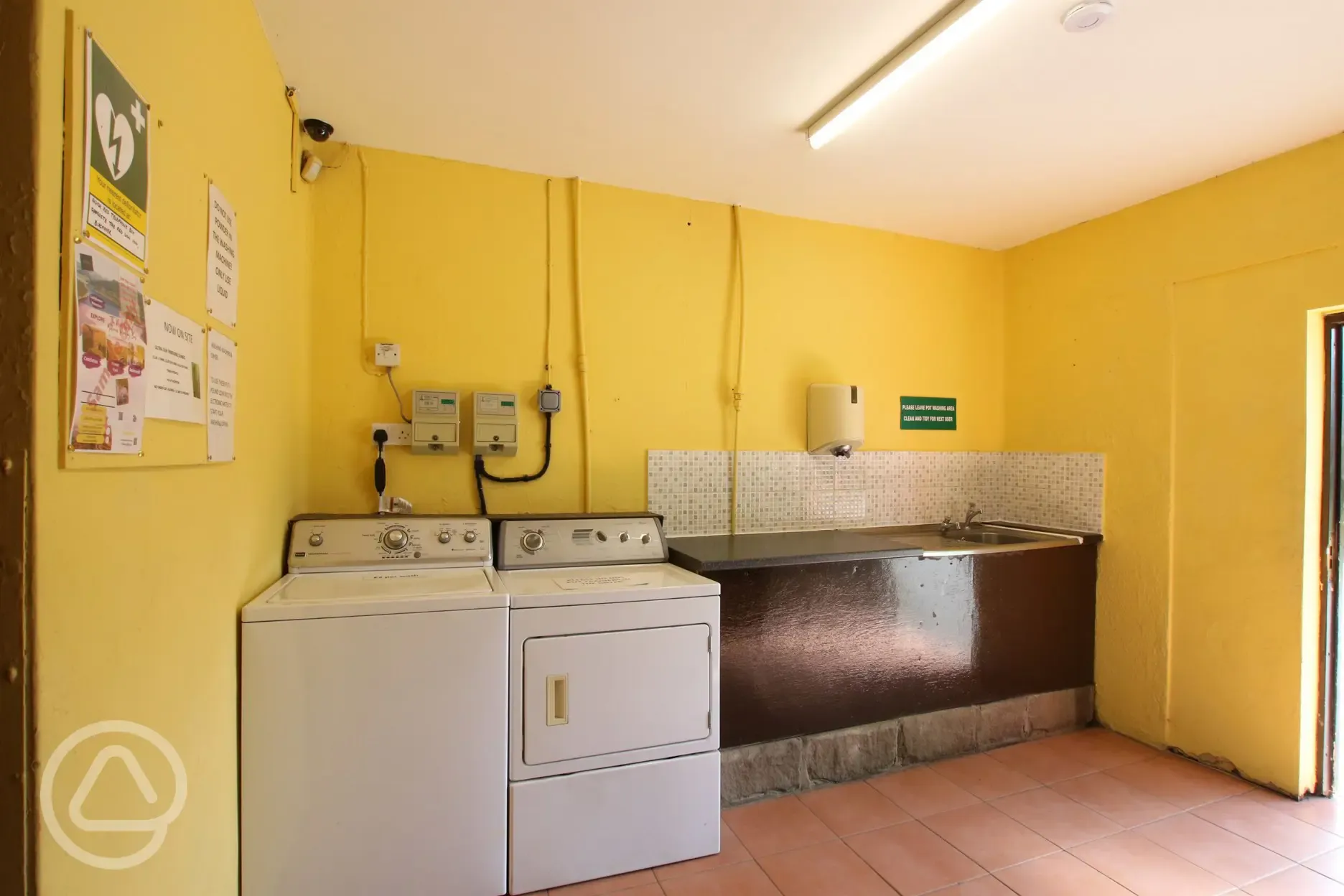 Communal washing up facilities with a launderette