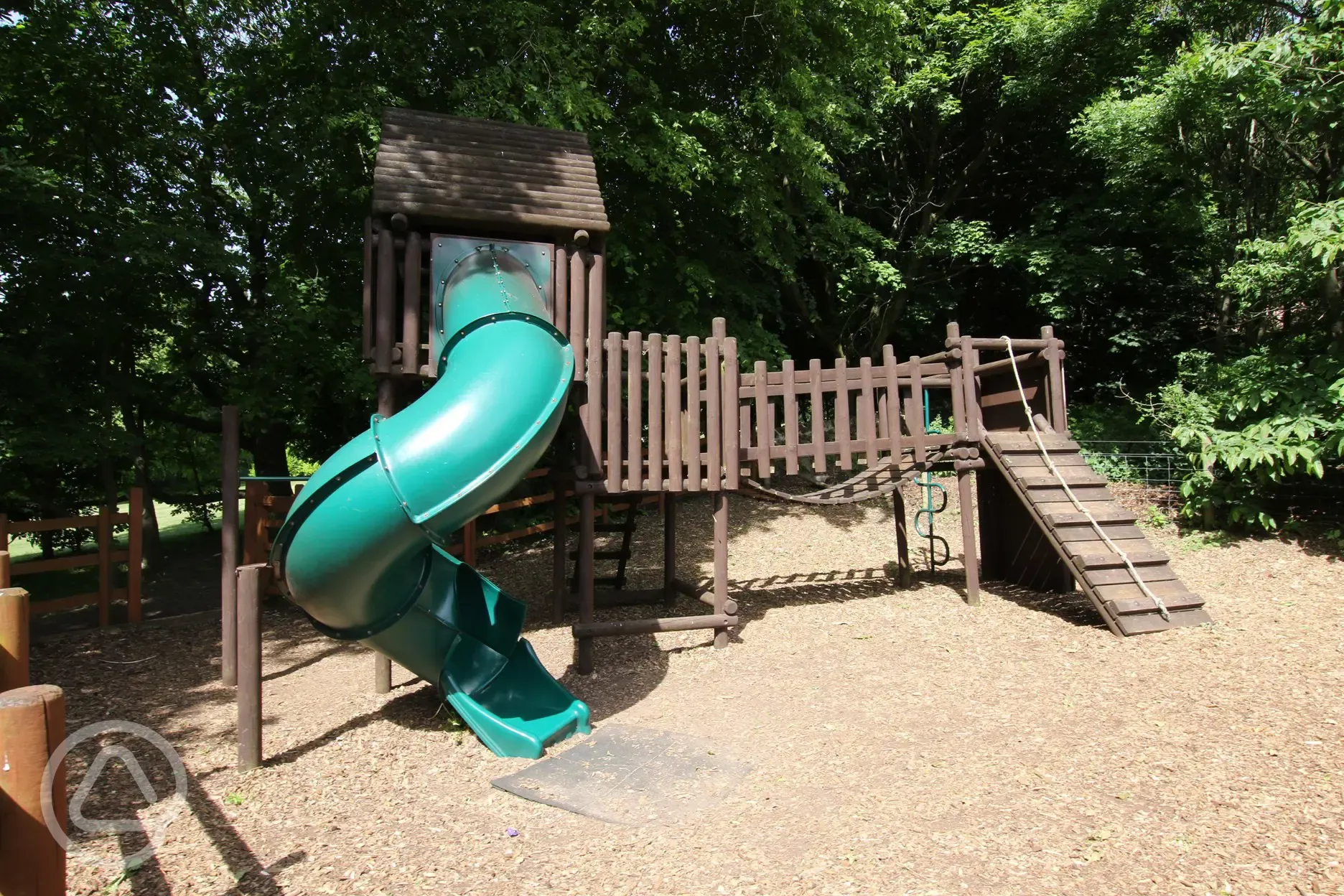 Outdoor play area with a slide