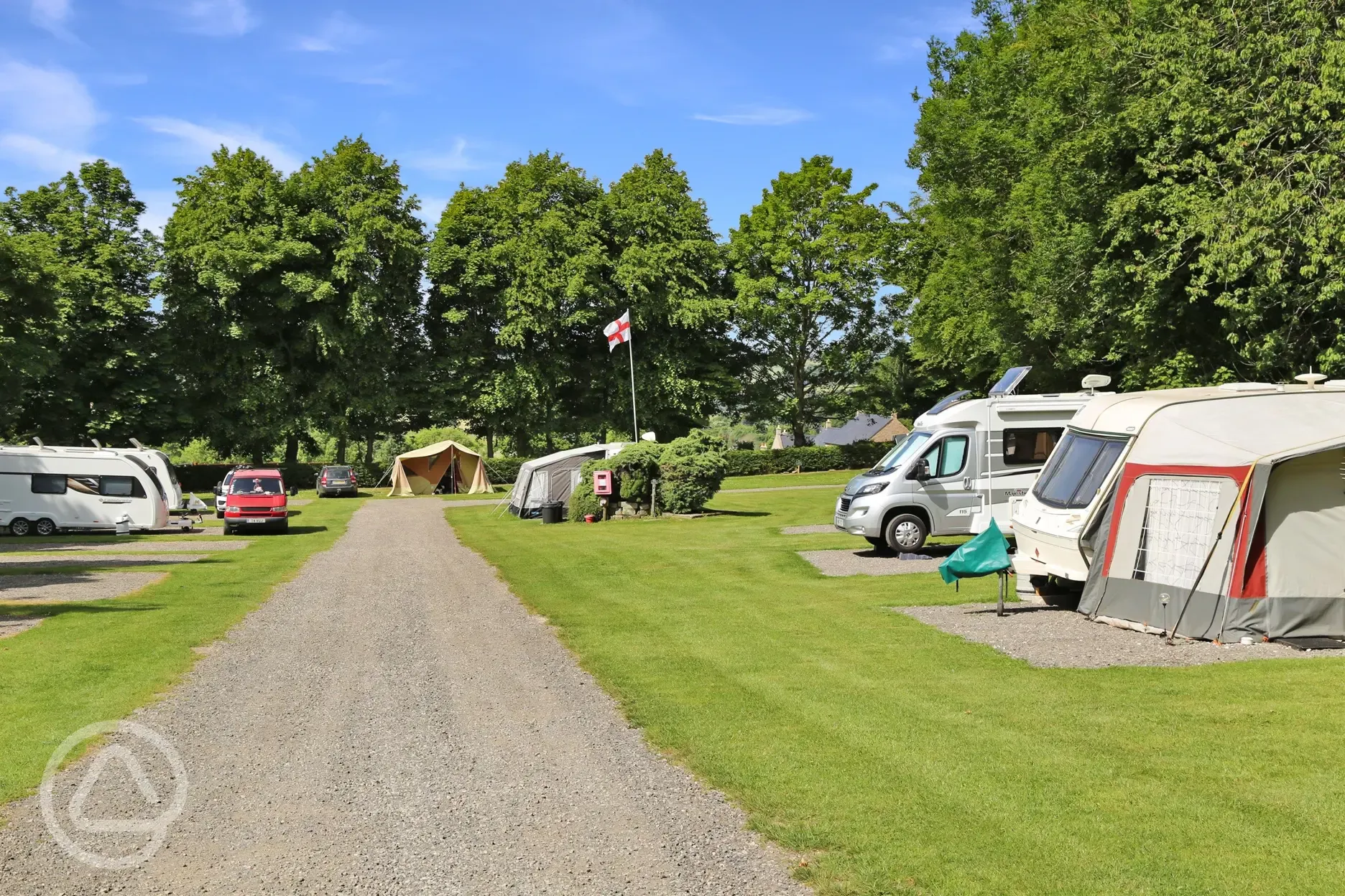 Electric hardstanding pitches at Barn Farm Campsite