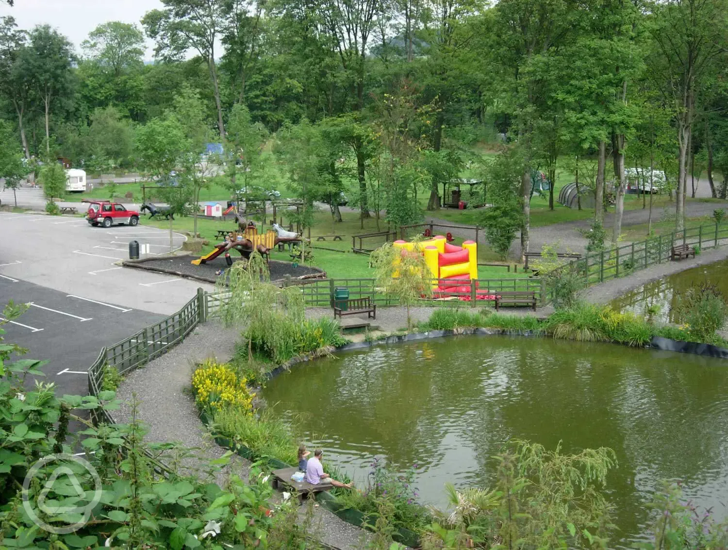 Fishing pond stocked with tench, carp and roach next to children's play park
