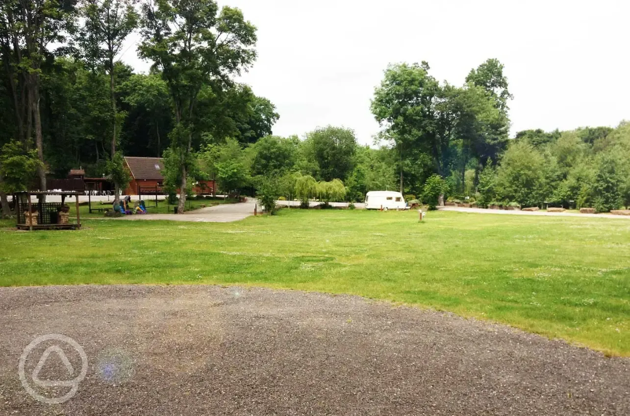 Electric grass pitches with the facilities block behind