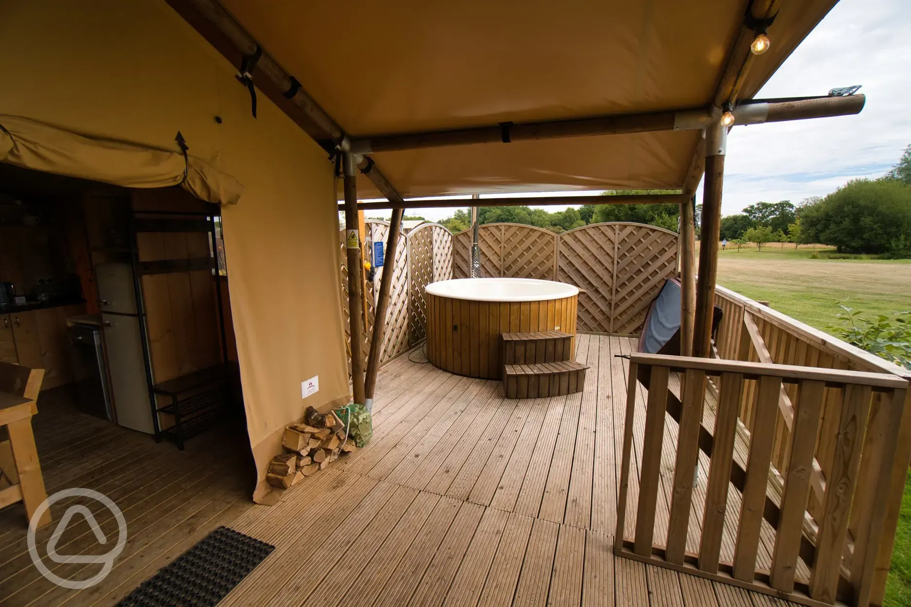 Safari tent decking and hot tub