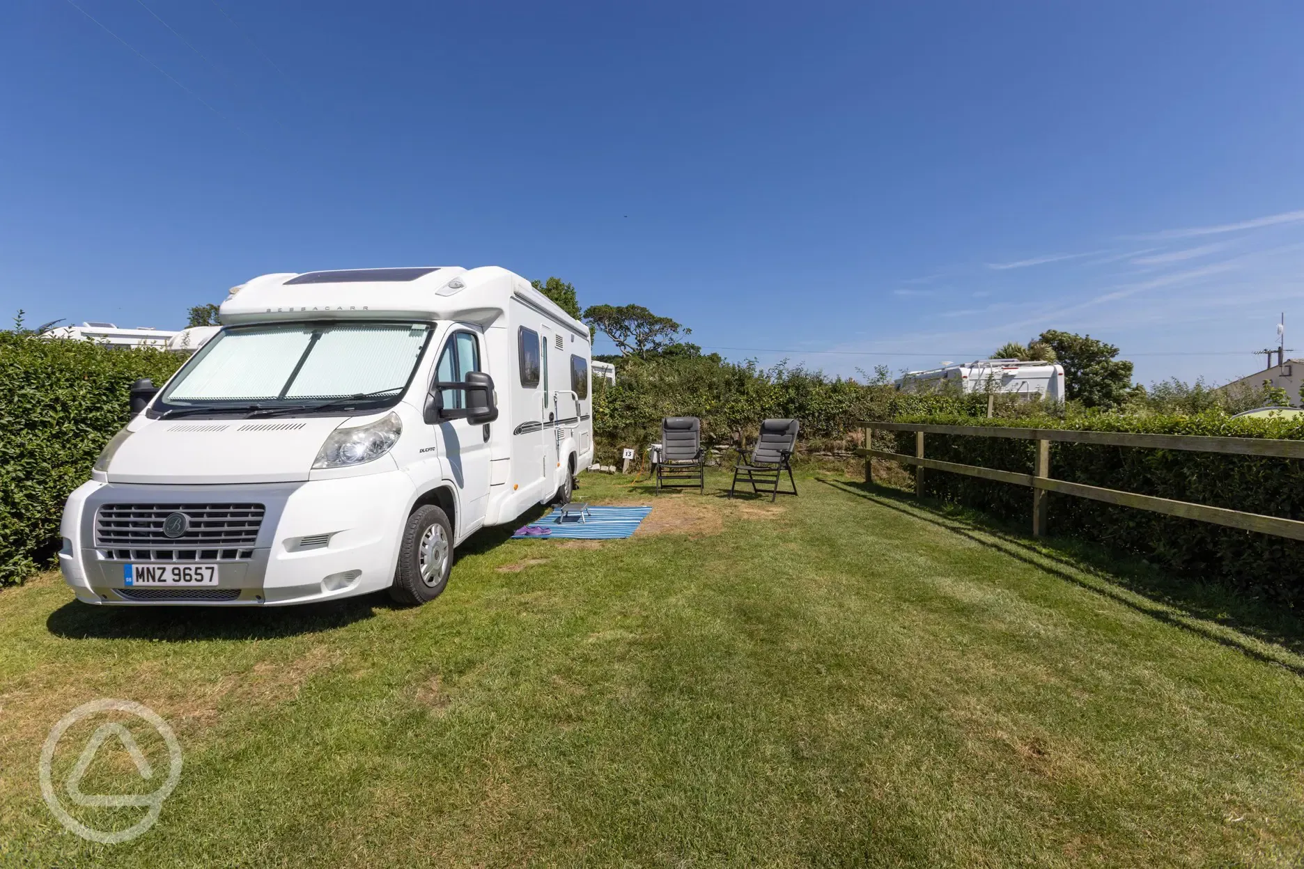 Electric grass pitch (10m x 10m) at Penhale Camping and Caravan Park