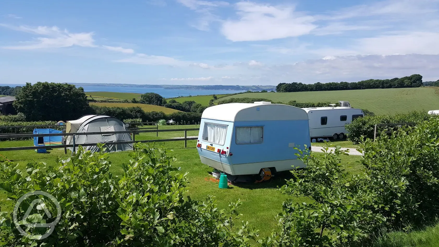 Electric grass pitches with distant sea views at Penhale Park